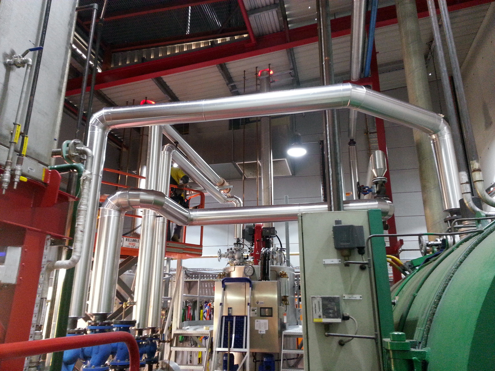 TRH Insulation project showing metal-clad pipework in an industrial plant